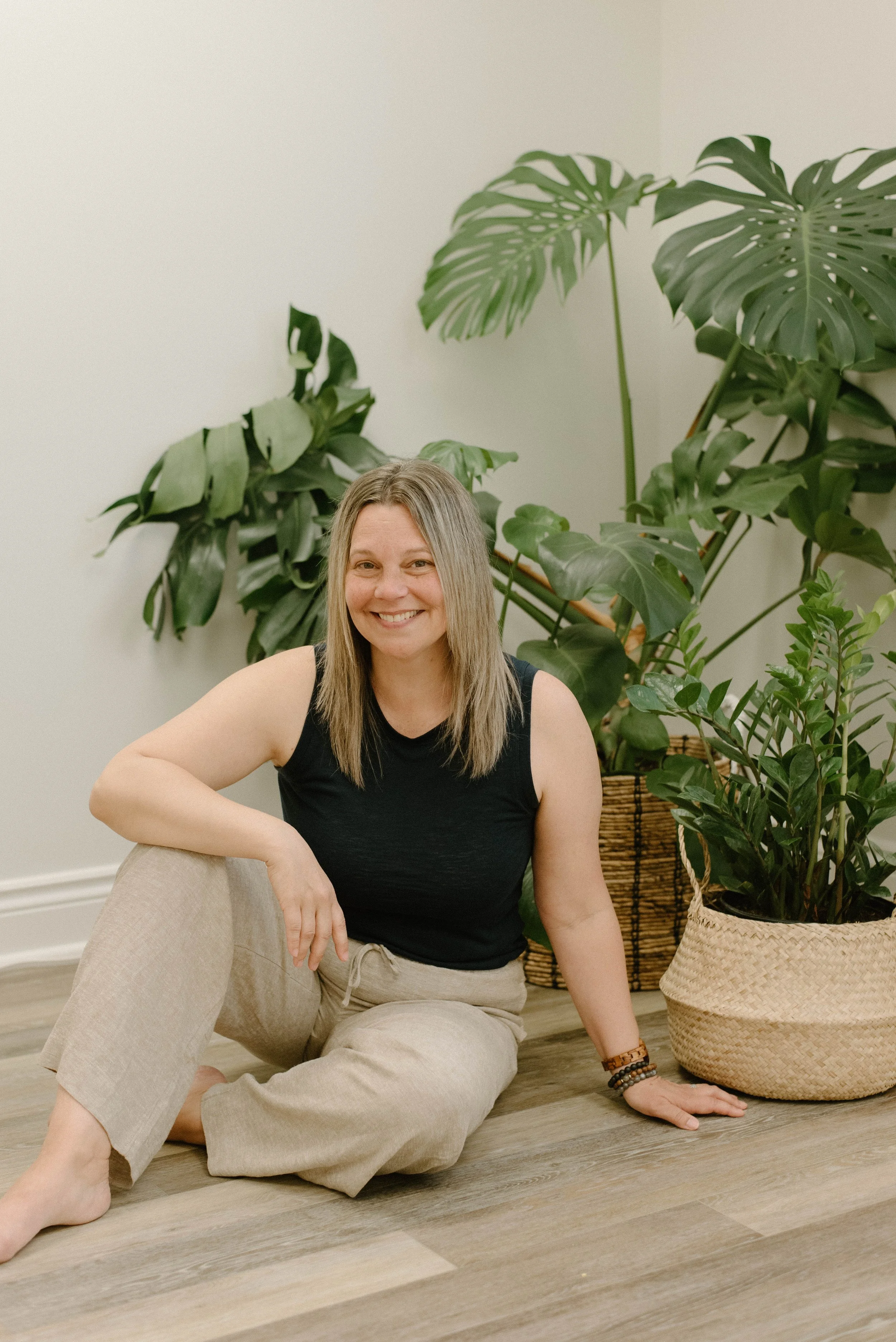 CEO Melissa smiling in celebration of mindfulness and the journey of entrepreneurship.