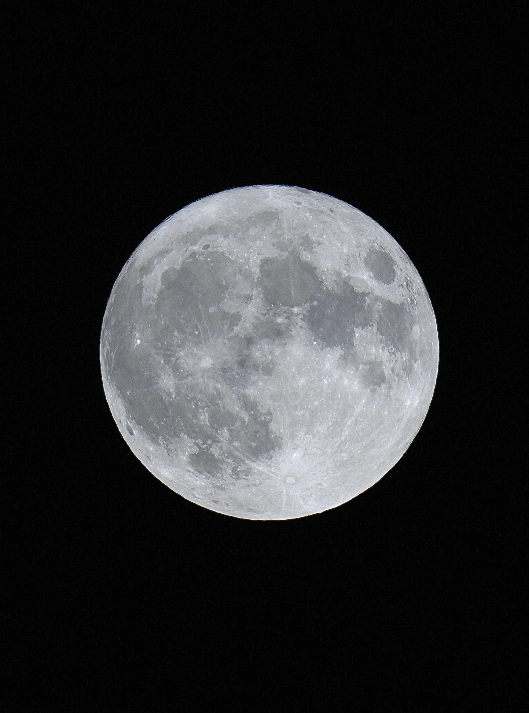 Full moon against a dark sky
