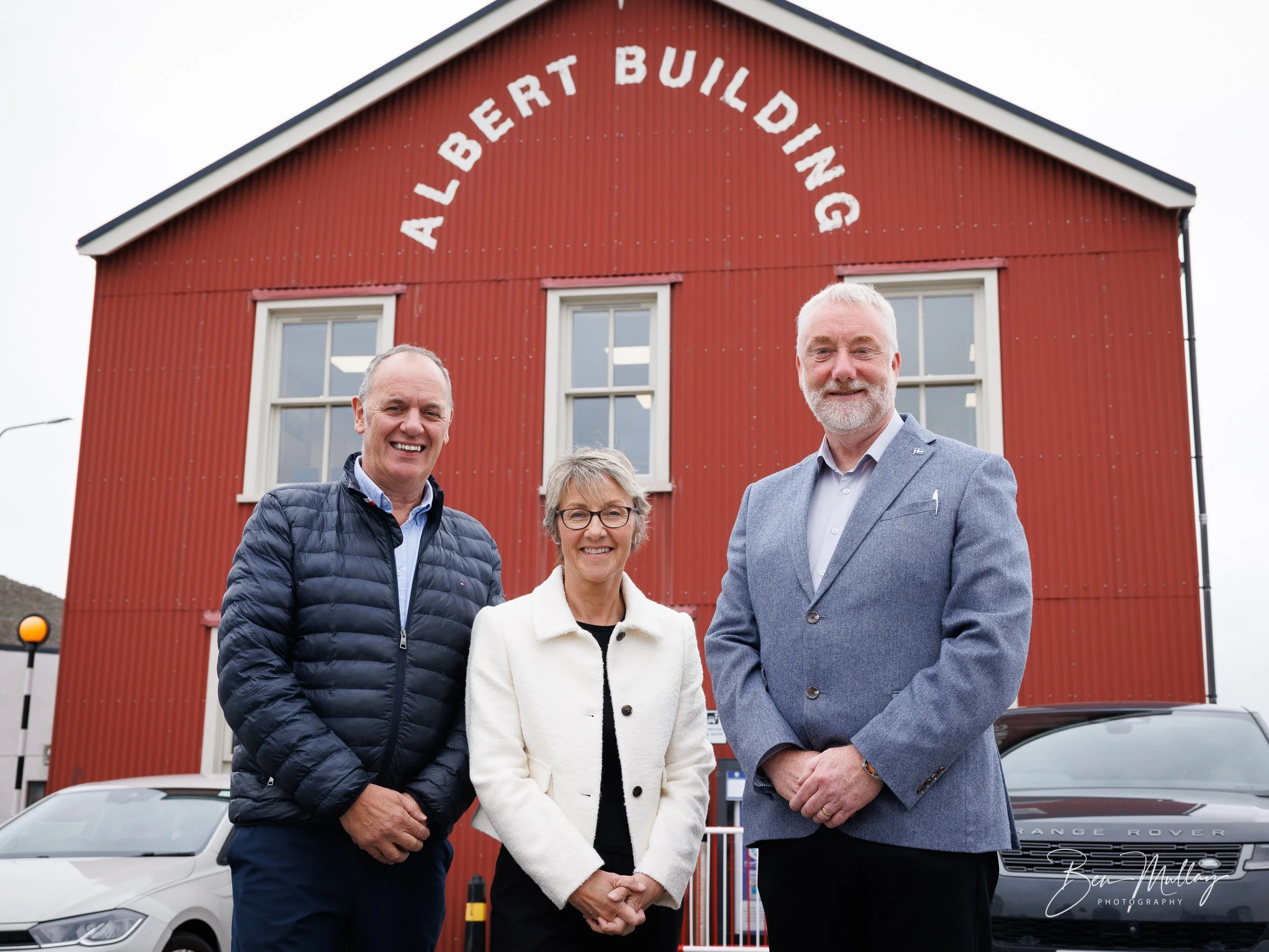 Group portrait of John Henderson, Chris Bain and Colin Nicholson for Lerwick Port Authority.