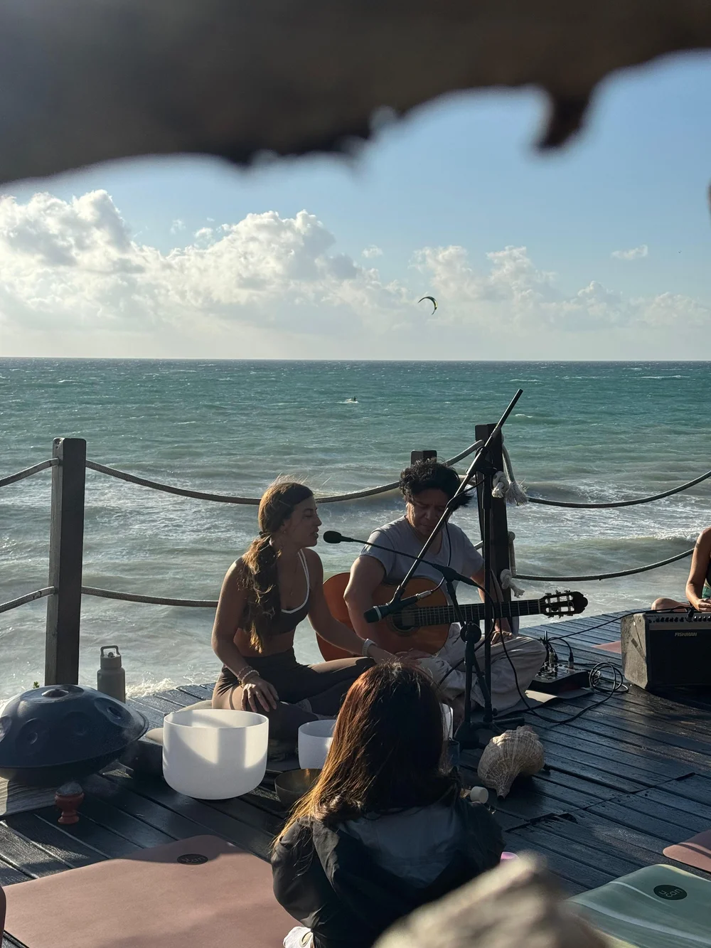 A group sound healing event by the sea