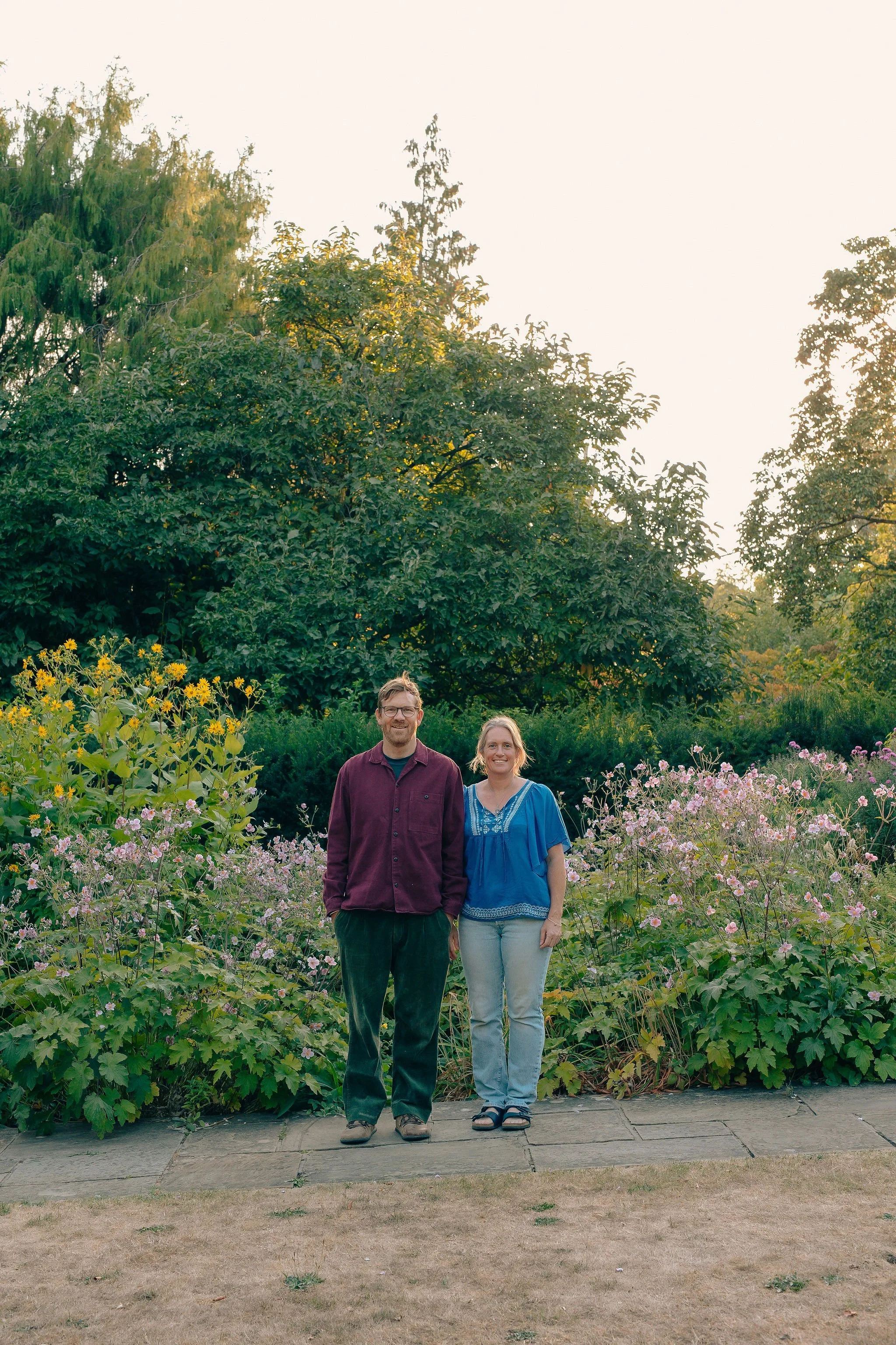 Garden designers in Bath standing next to large herbaceous planting