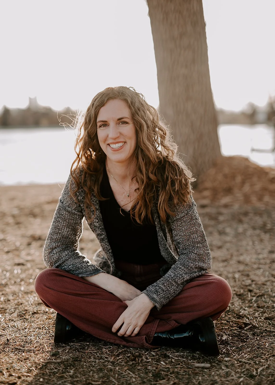 Aiya Staller woman sitting on ground