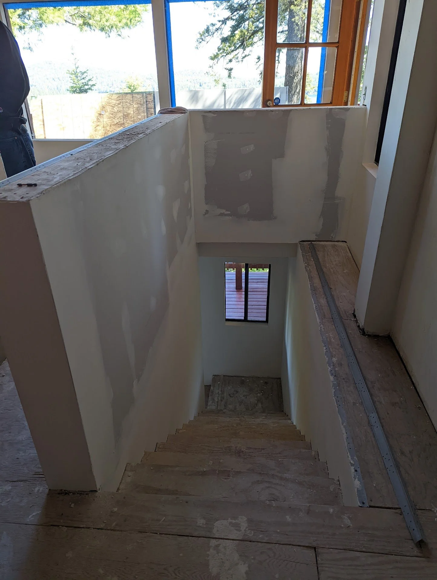 Stairwell with pony wall installation.