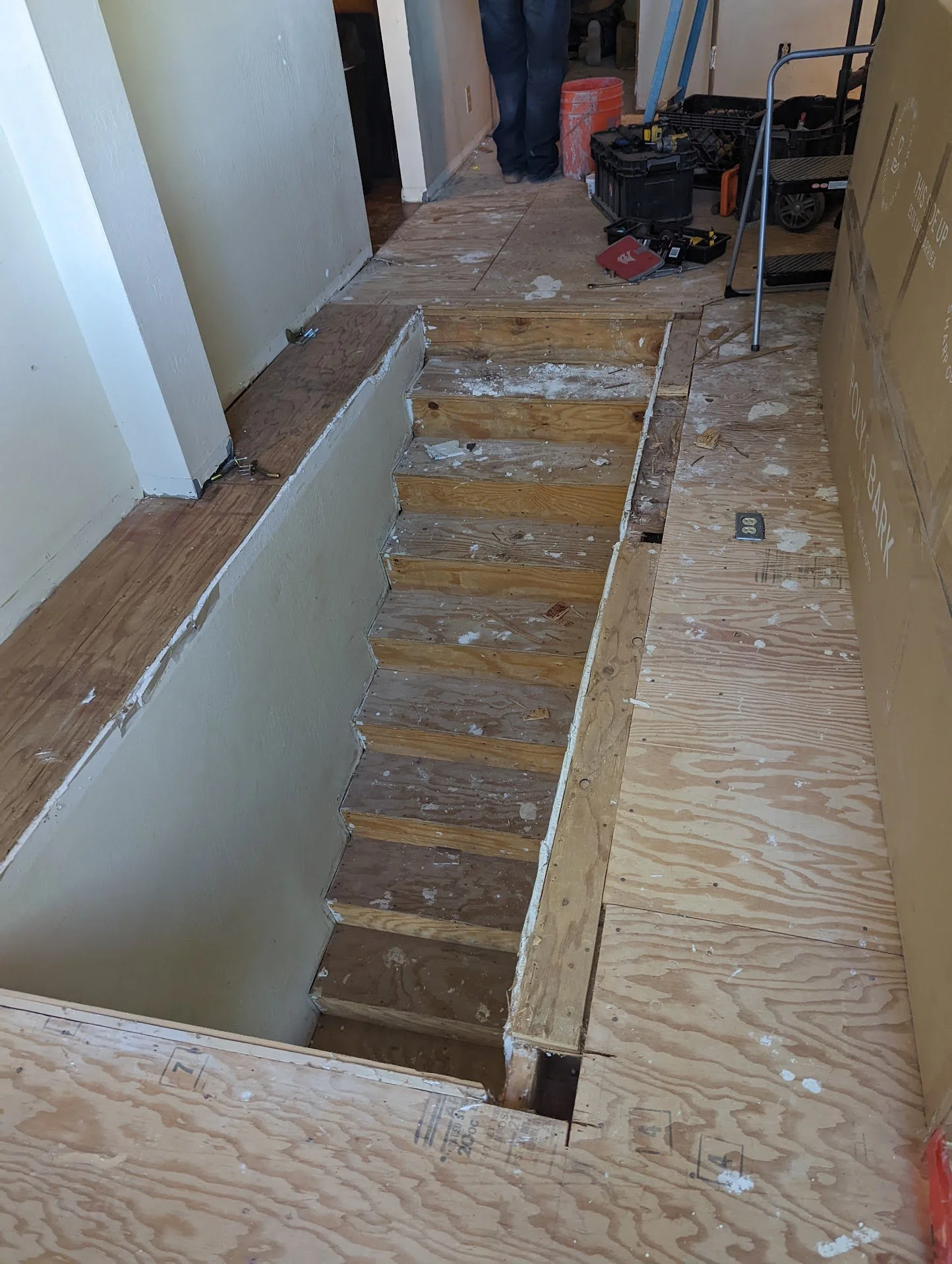 Prepping to do vinyl stairwell with handrails.