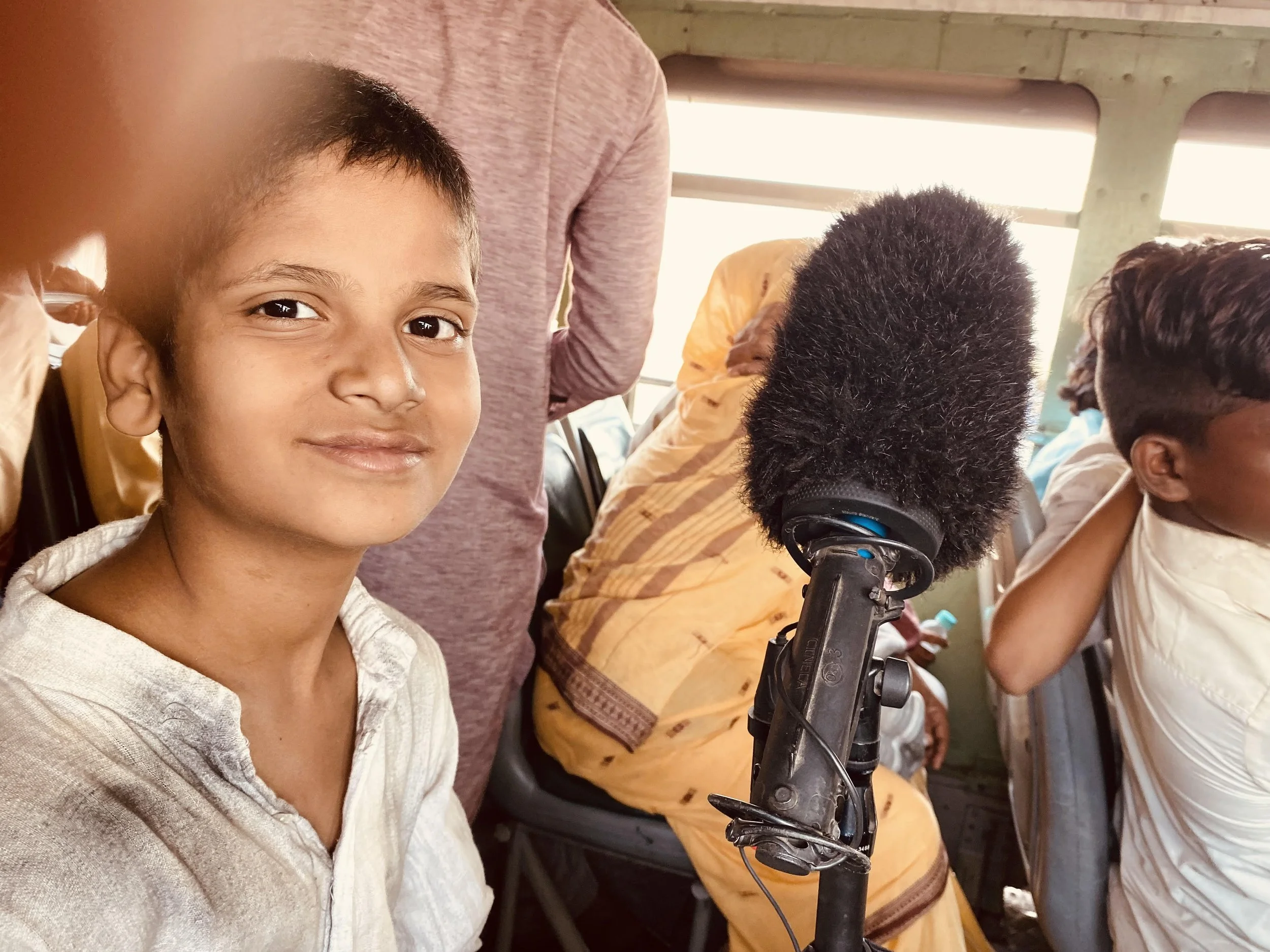 A young boy that took a liking to my sound craft while filming in a bus on Shantaram in Mumbai.