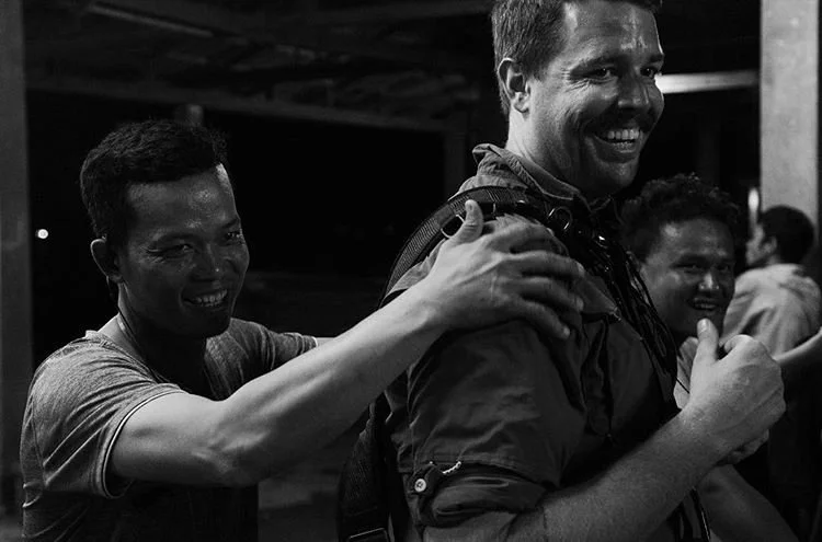 Dane Cody having a laugh with fellow crew members during a break from filming on the feature film Buoyancy, Cambodia.