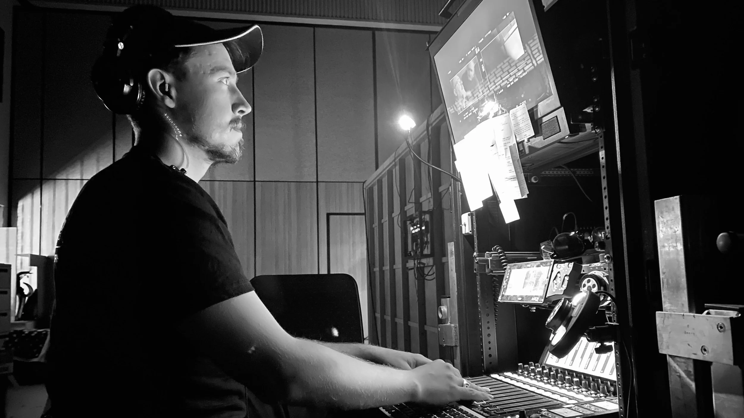 Michael McEvoy mixing a few takes on Land of Bad, feature film.