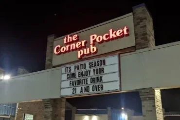 Image of The Corner Pocket Pub sign at night