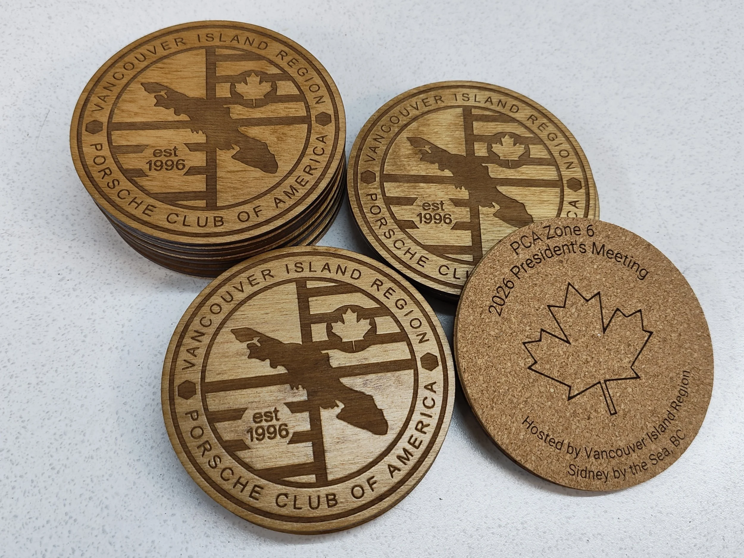 Birch plywood laser engraved 4 inch round coasters with engraved cork backing