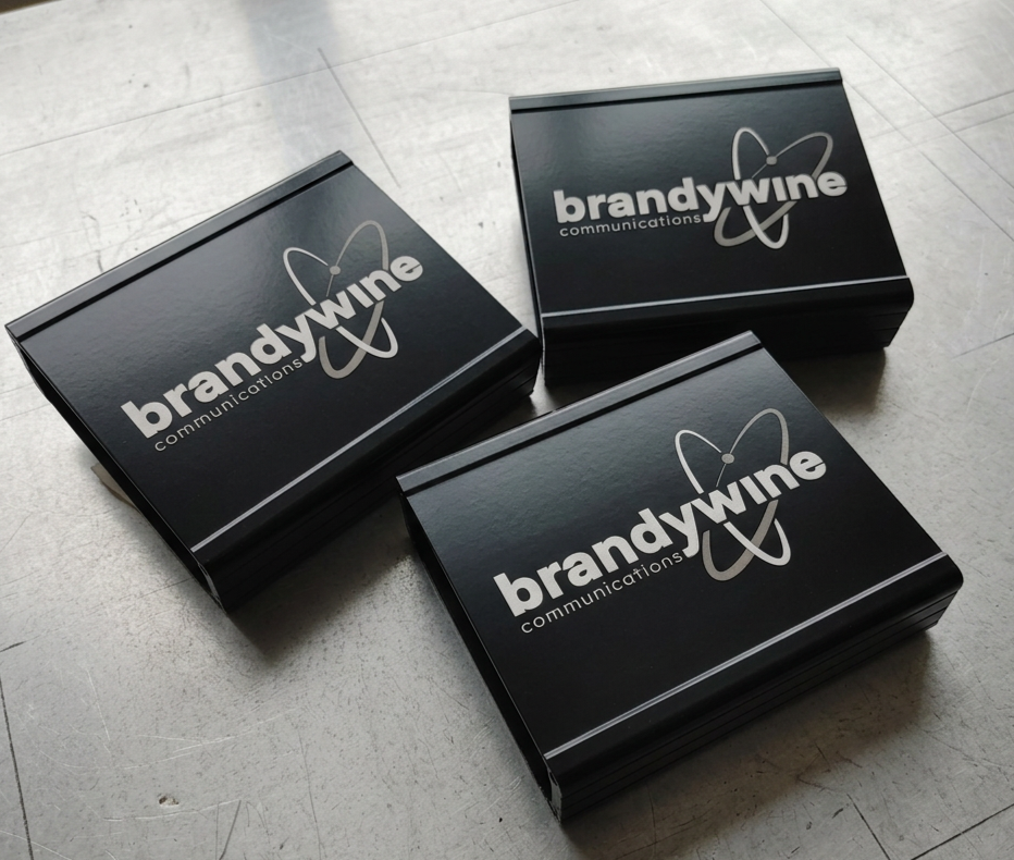 Laser engraved powder coated metal enclosures