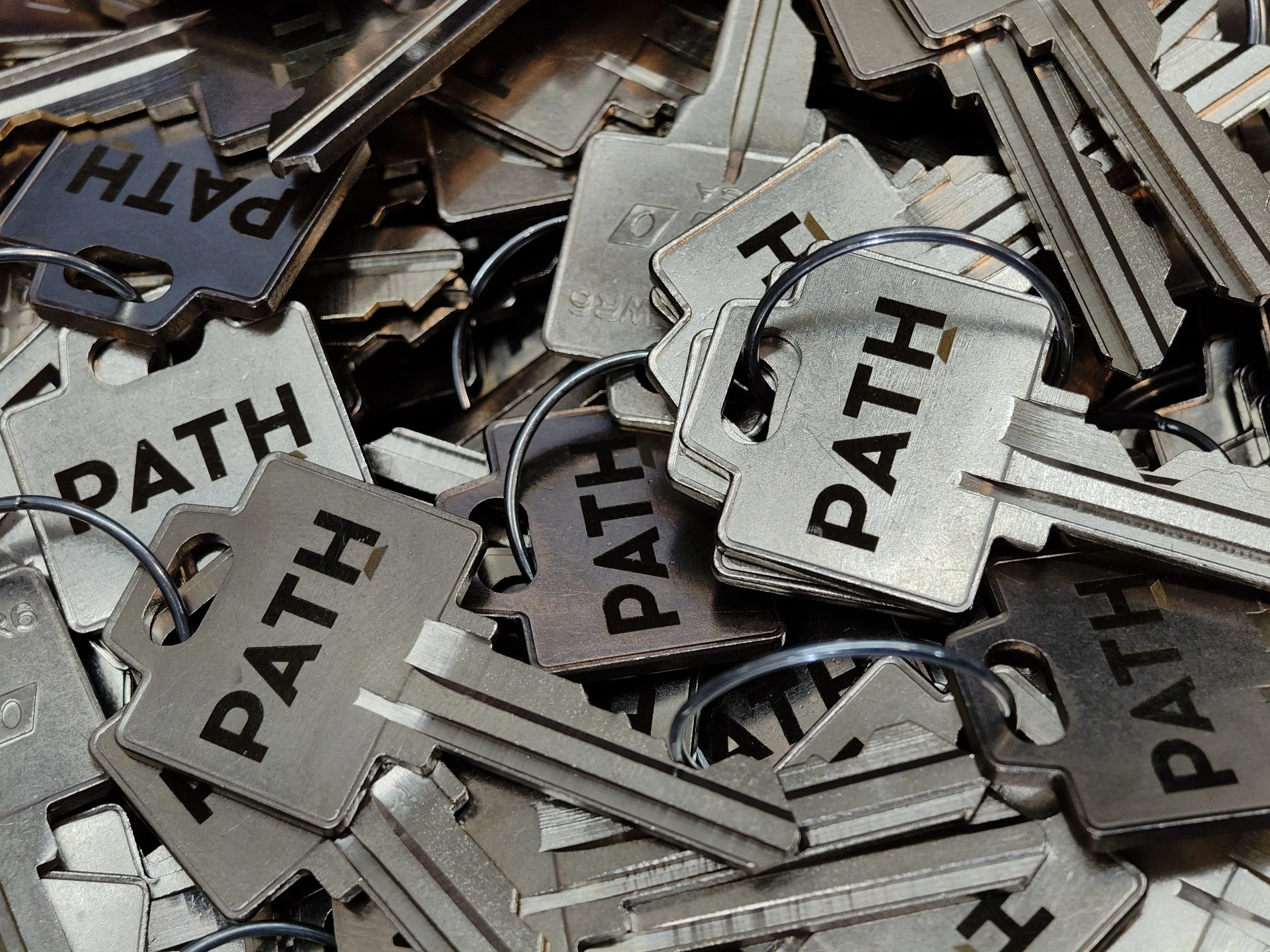 Hundreds of engraved house keys with company logo