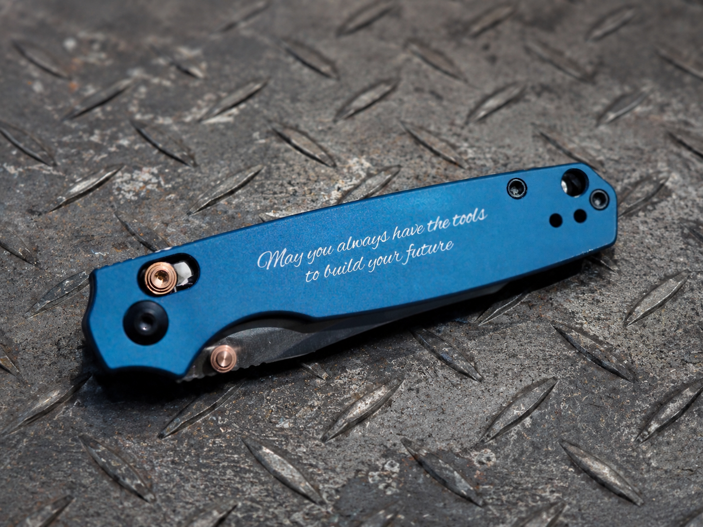 Laser engraved folding knife as a graduation gift