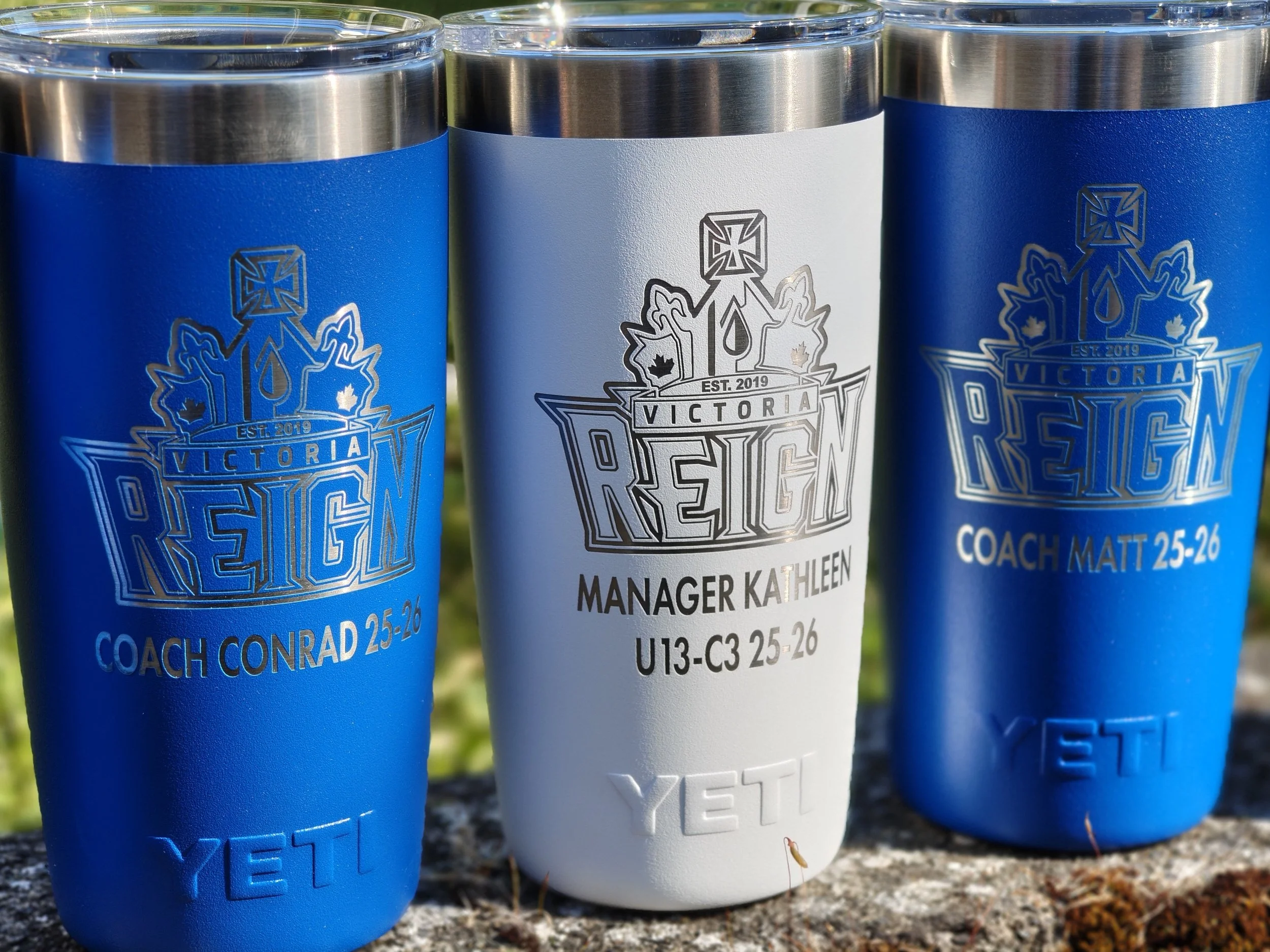 YETI tumblers laser engraved with the VIctoria Reign hockey logo. Additional engraved text can be added
