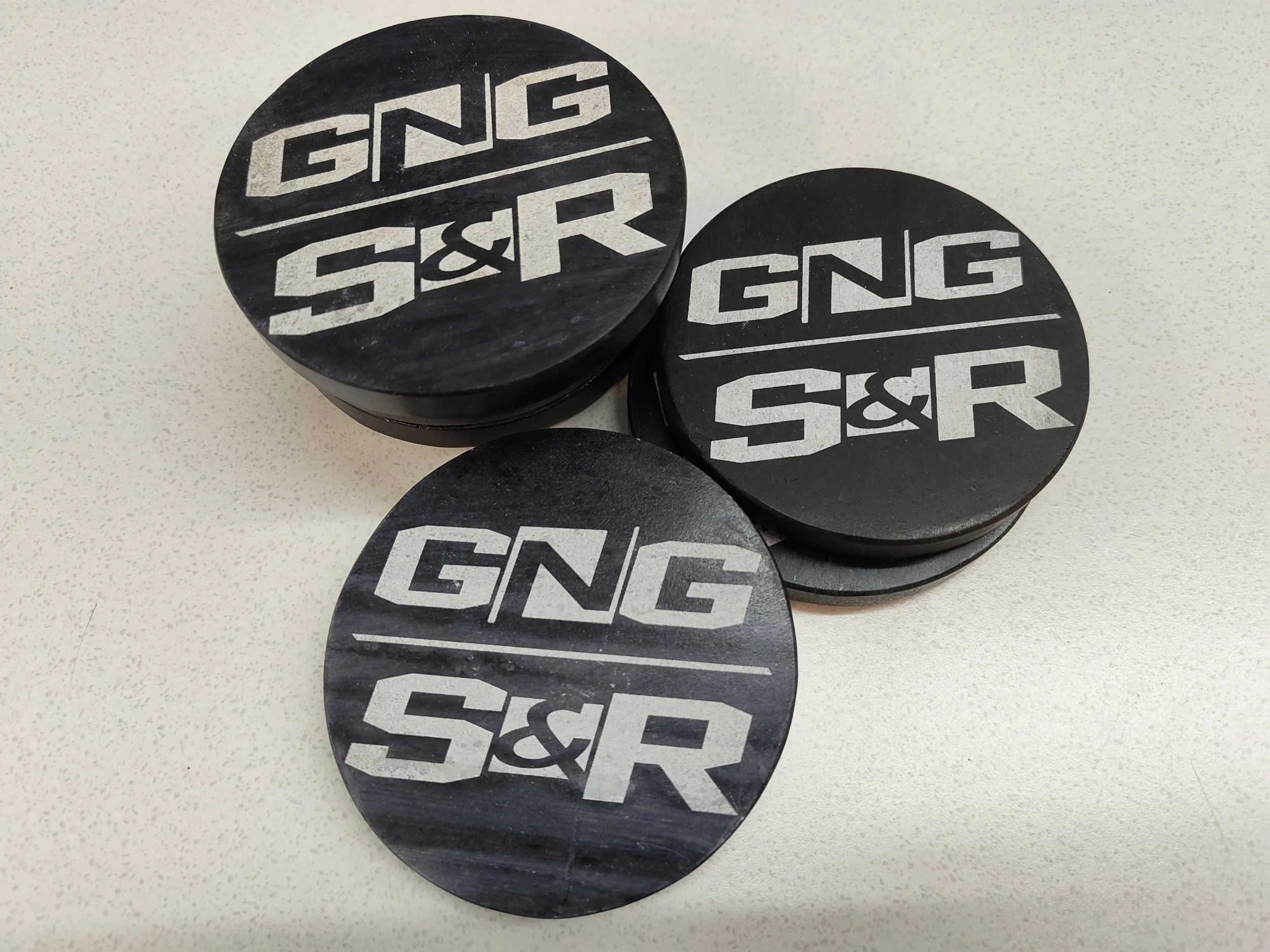 Black marble laser engraved coasters with cork backing