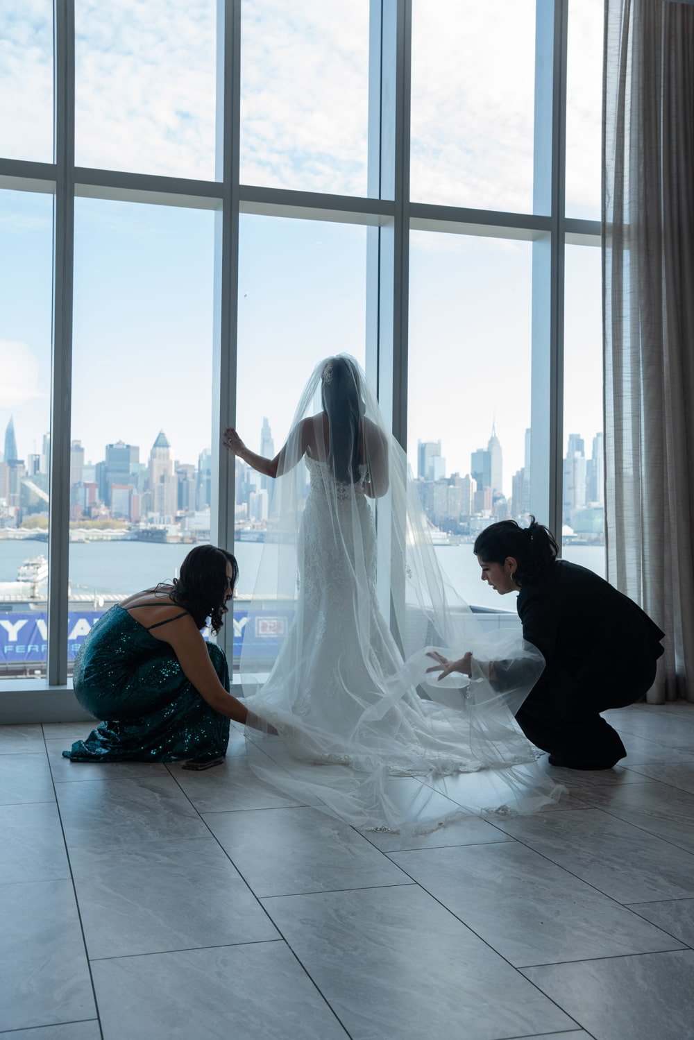 Ana-Valladares-fixing-wedding-veil.jpg
