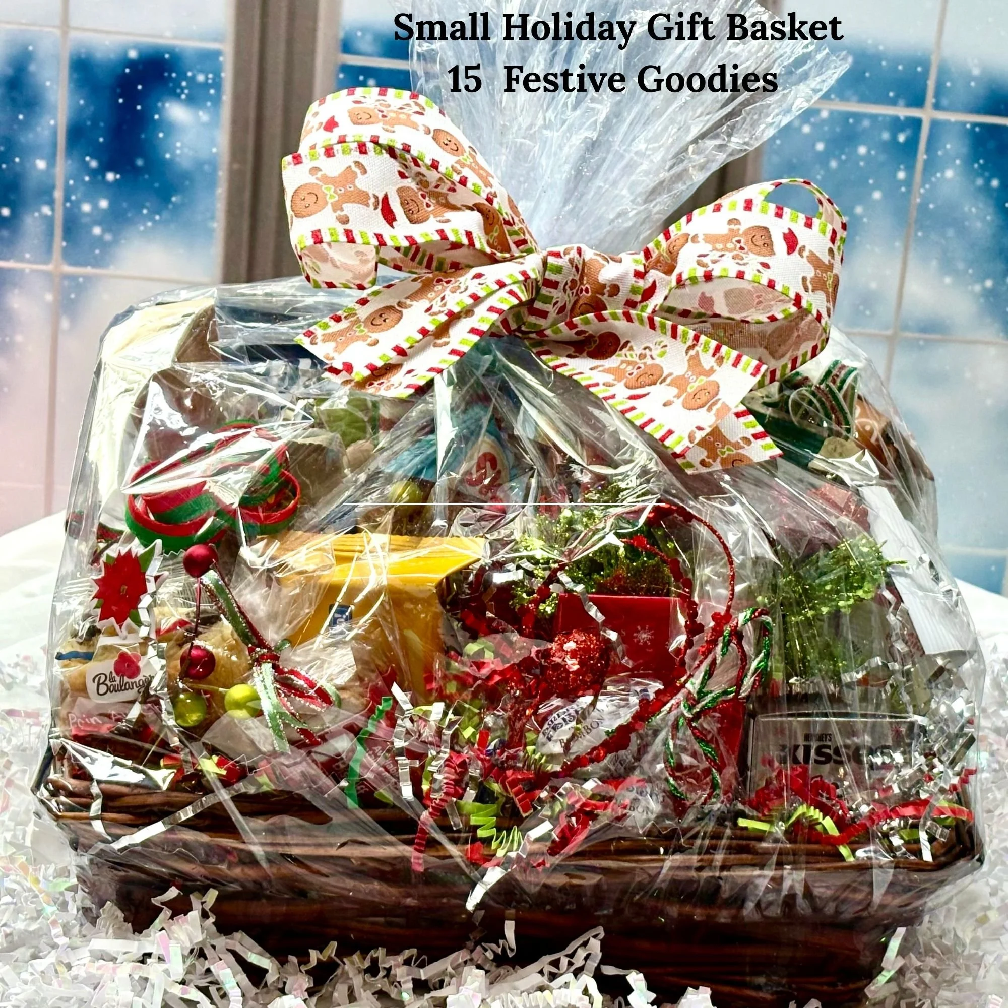 Small holiday gift basket with 15 full-size treats, decorated with gingerbread-themed ribbon and seasonal accents.