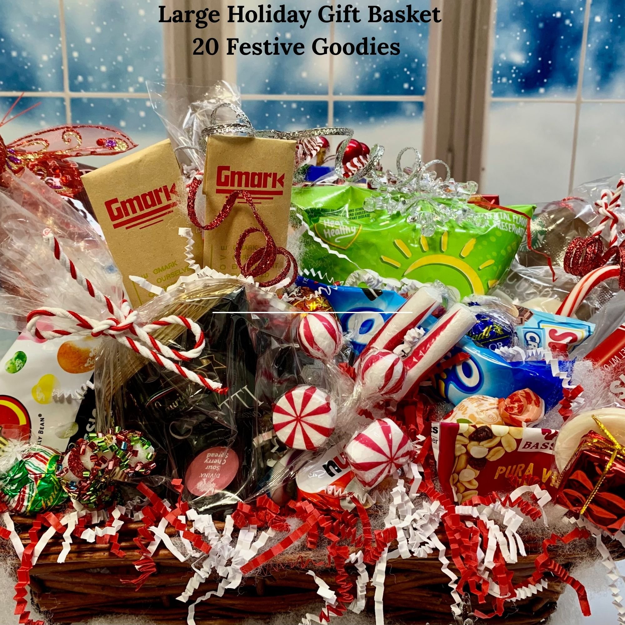 Large holiday gift basket filled with 20 full-size treats, candies, and seasonal snacks with red, white, and green candy cane décor.