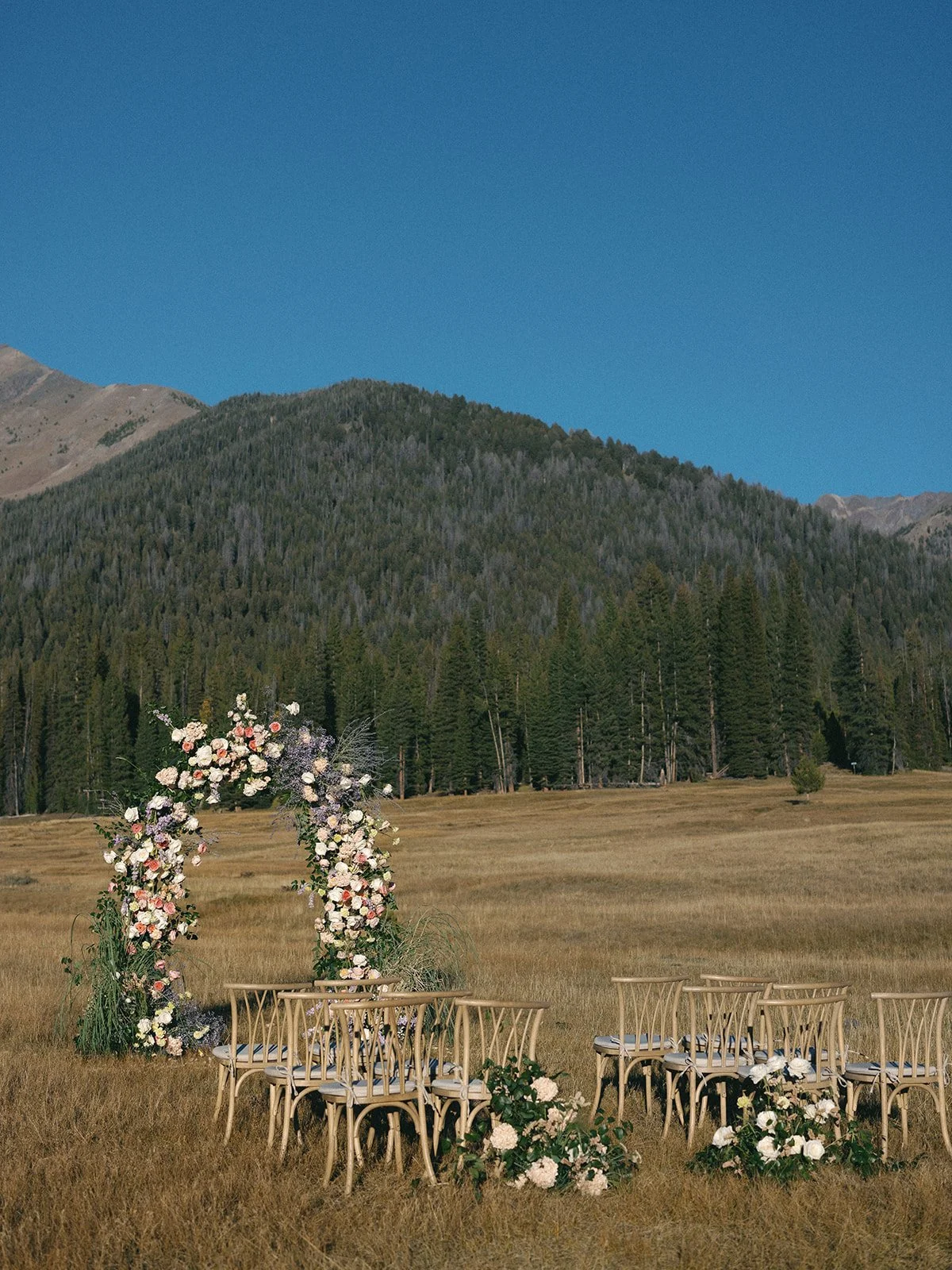 galena-lodge-bailly-spencer-elopement-intimate-wedding-celebration-sun-valley-idaho-kayla-lucio-photo-worldwide-photographer-colorful-blooms-floral-arch-113.jpg