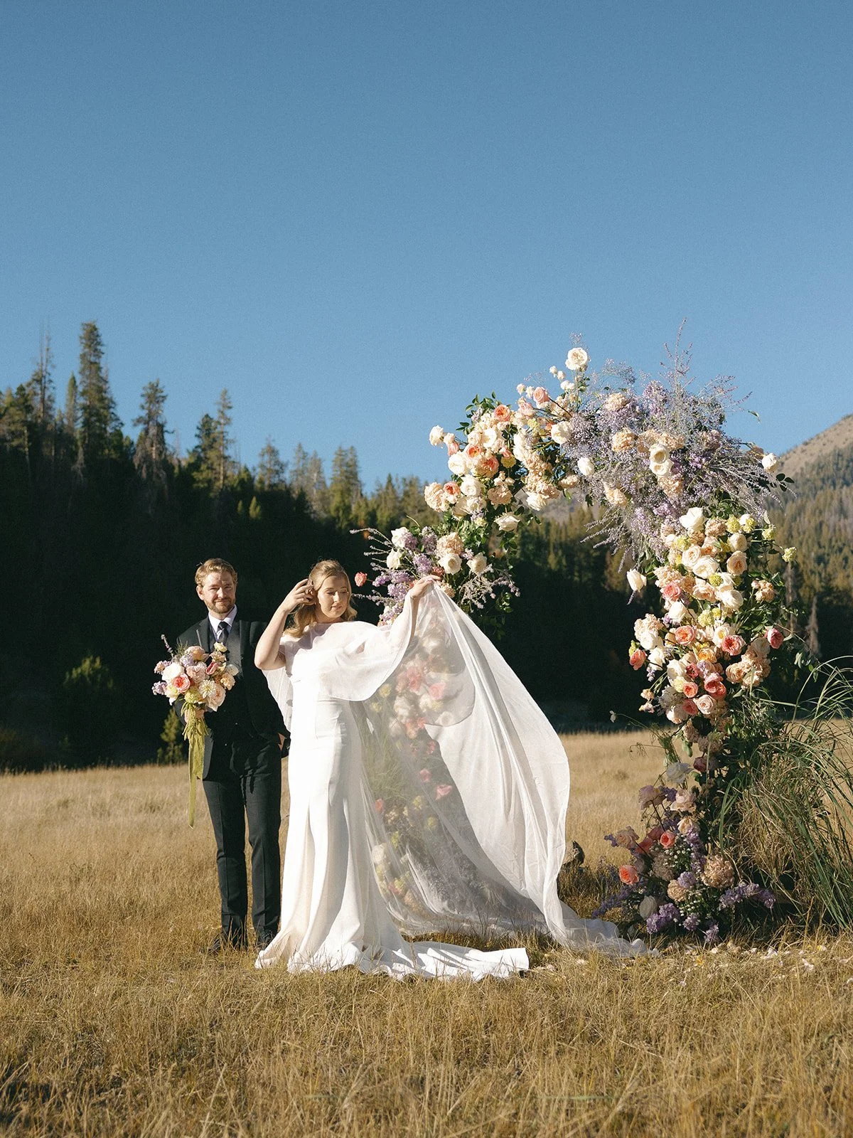 galena-lodge-bailly-spencer-elopement-intimate-wedding-celebration-sun-valley-idaho-kayla-lucio-photo-worldwide-photographer-colorful-blooms-floral-arch-38.jpg