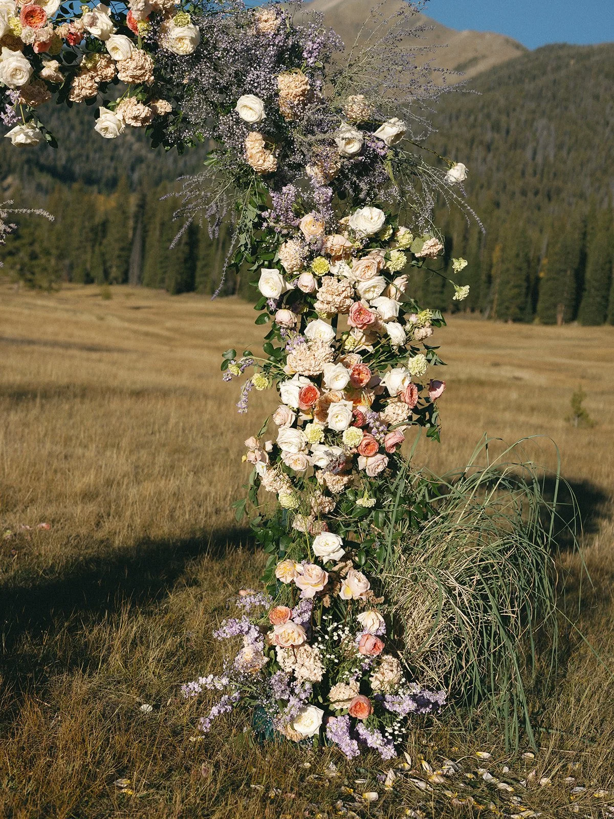 galena-lodge-bailly-spencer-elopement-intimate-wedding-celebration-sun-valley-idaho-kayla-lucio-photo-worldwide-photographer-colorful-blooms-floral-arch-122.jpg
