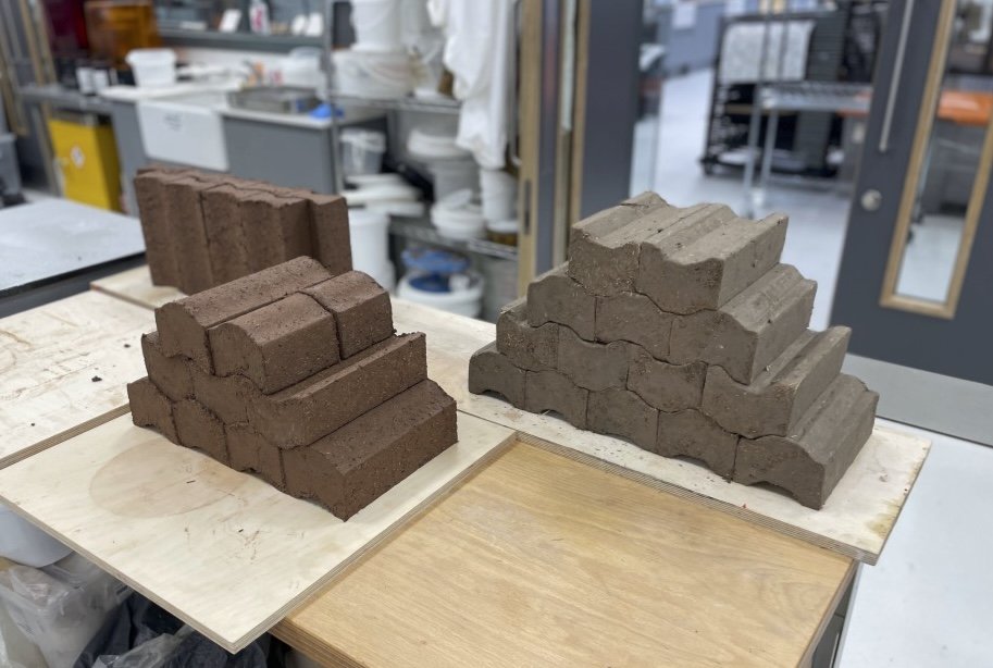extruded earth bricks stacked .jpg