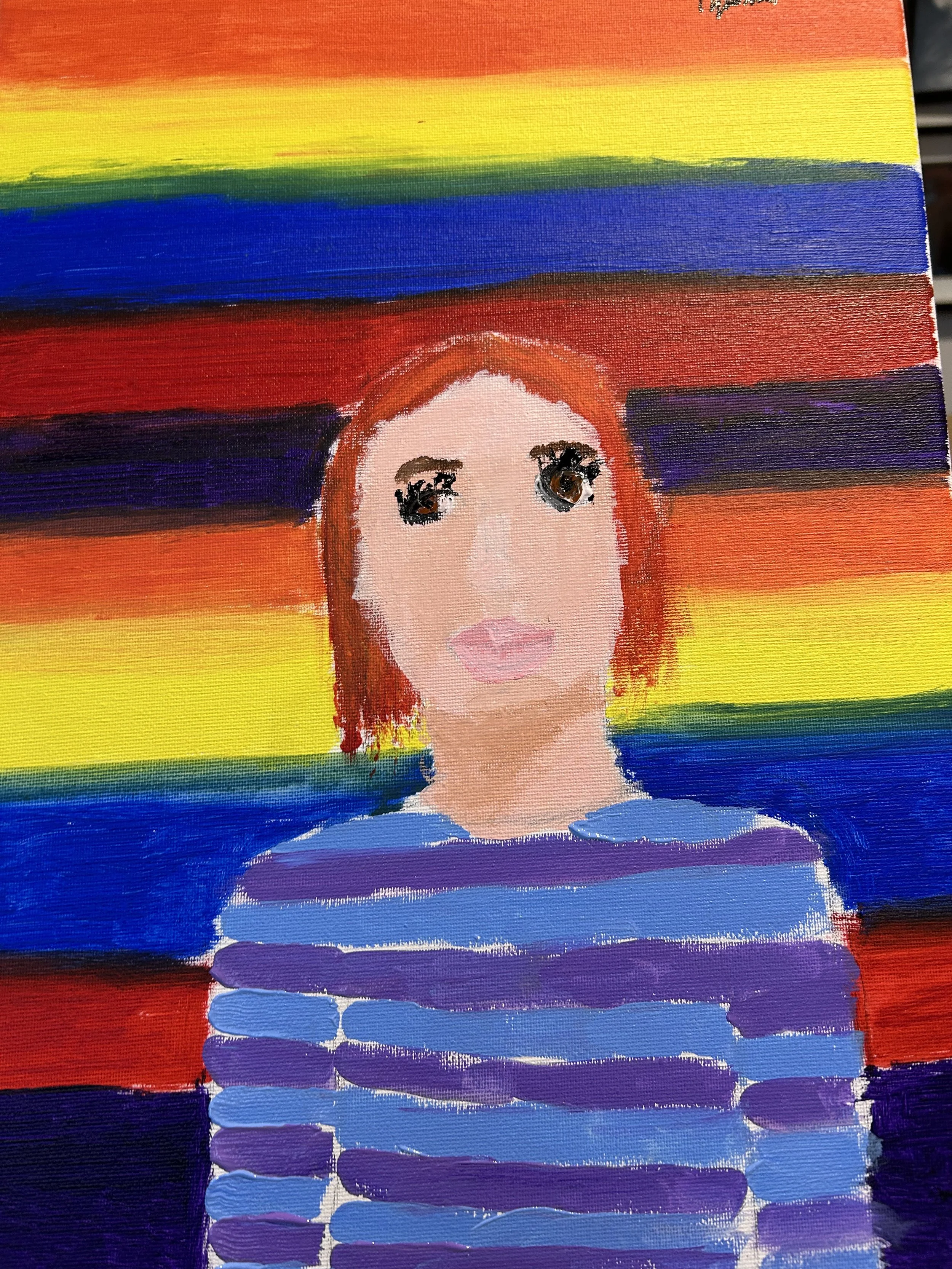 A portrait of a person with red hair, large eyes, and light skin, set against a vibrant rainbow striped background.