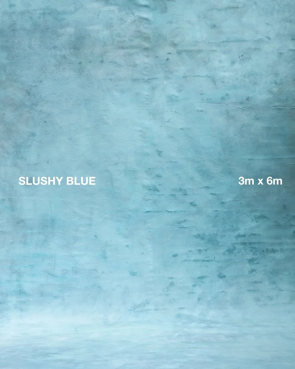 A painted wall in slushy blue color with dimensions 3 meters by 6 meters marked on it.