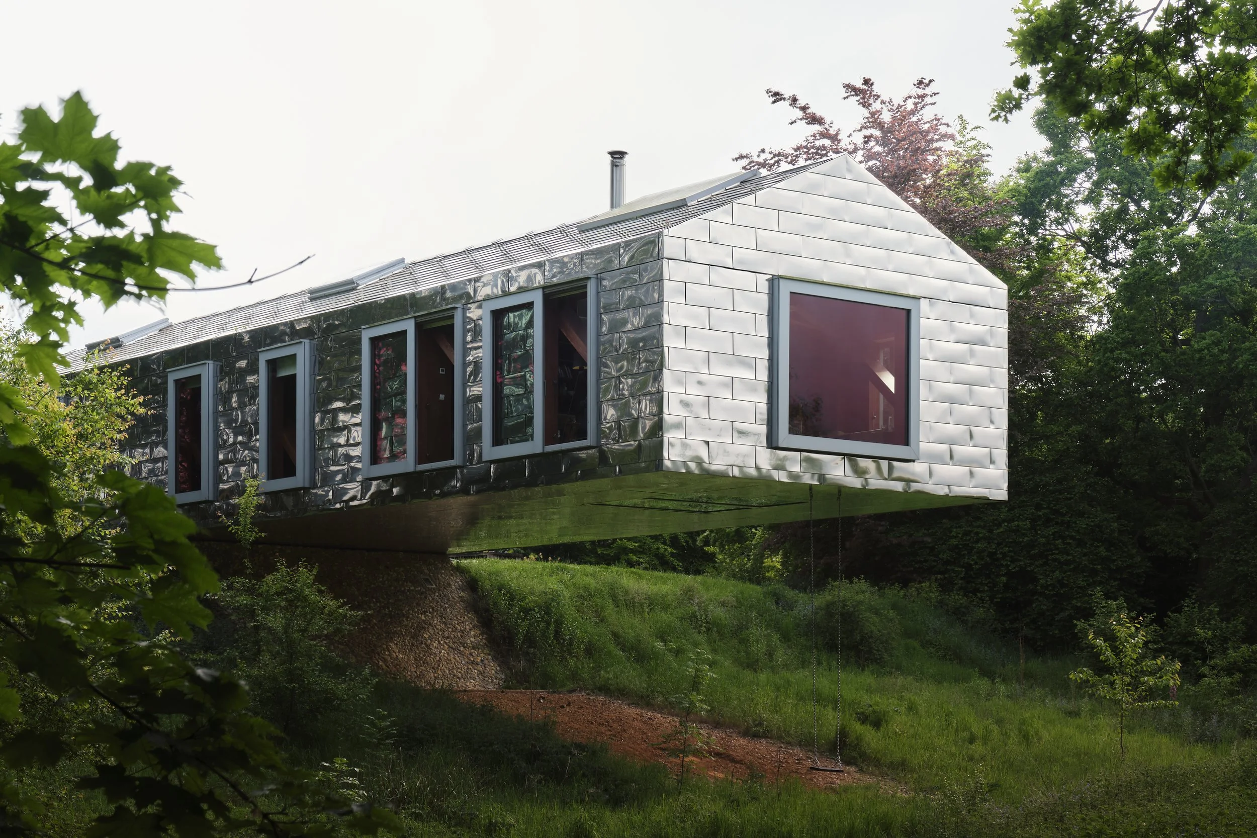 Contemporary suspended steel clad house,  offering clean architectural lines and strong natural light for exterior shoots