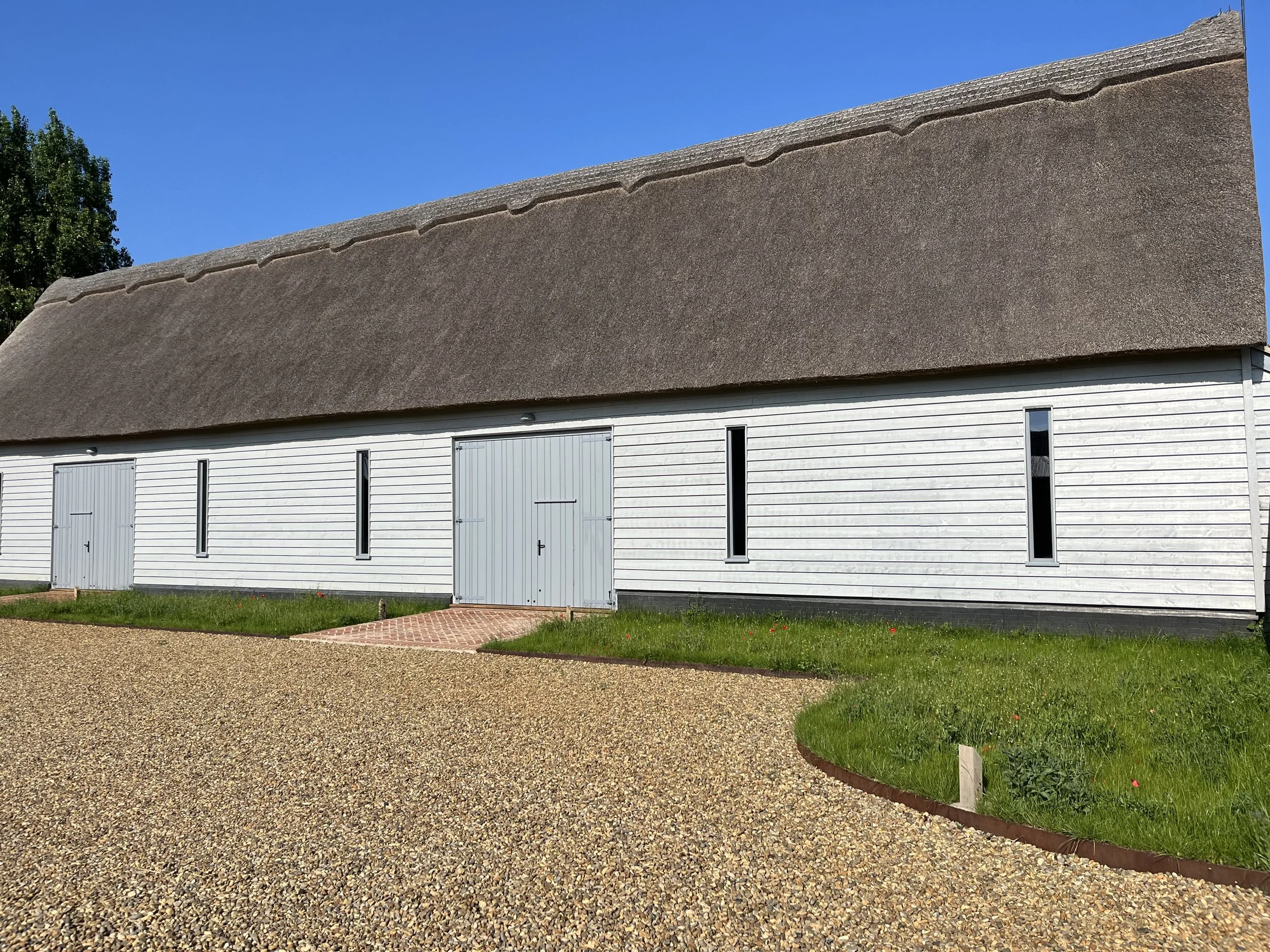 Exterior view of REF: uk/018 Grade II Listed Thatched Barn with Timber Frame