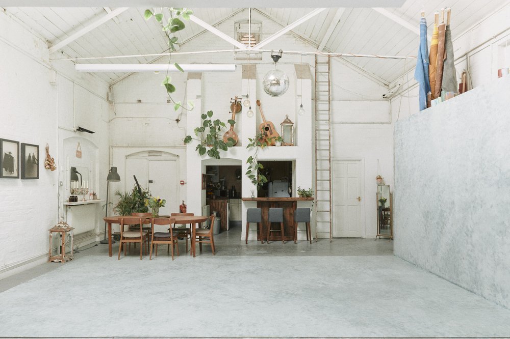 White interior, vintage furniture in a photography studio located in North London