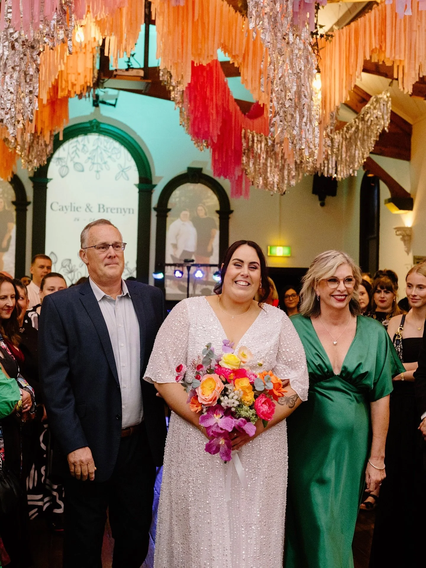 💜Caylie &amp; Bren💜 full of sweet laughs, happy tears, and all the people who mean the most 🥹💛
.
.
.

Photography &amp; Videography @wildandwoozy 
Celebrant @customcelebrations_by_dee 
Venue @thehallbrunswick 
Flowers @studioalyssum 
Hair &amp; M