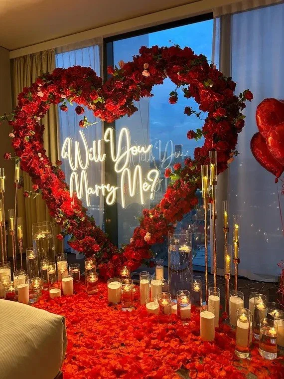 Item: #199

Will you MARRY ME Rose heart backdrop with sign, candles, rose petals and balloons.