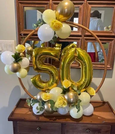 ITEM #715: Balloon Centerpieces

Theme? Give us a Call or Fill out our Form. We can customize a Design for you! Send us an Email: info@garnished-events.com. INCLUDE: Item Number and Color Scheme. Budget. Date of Event. City & State.