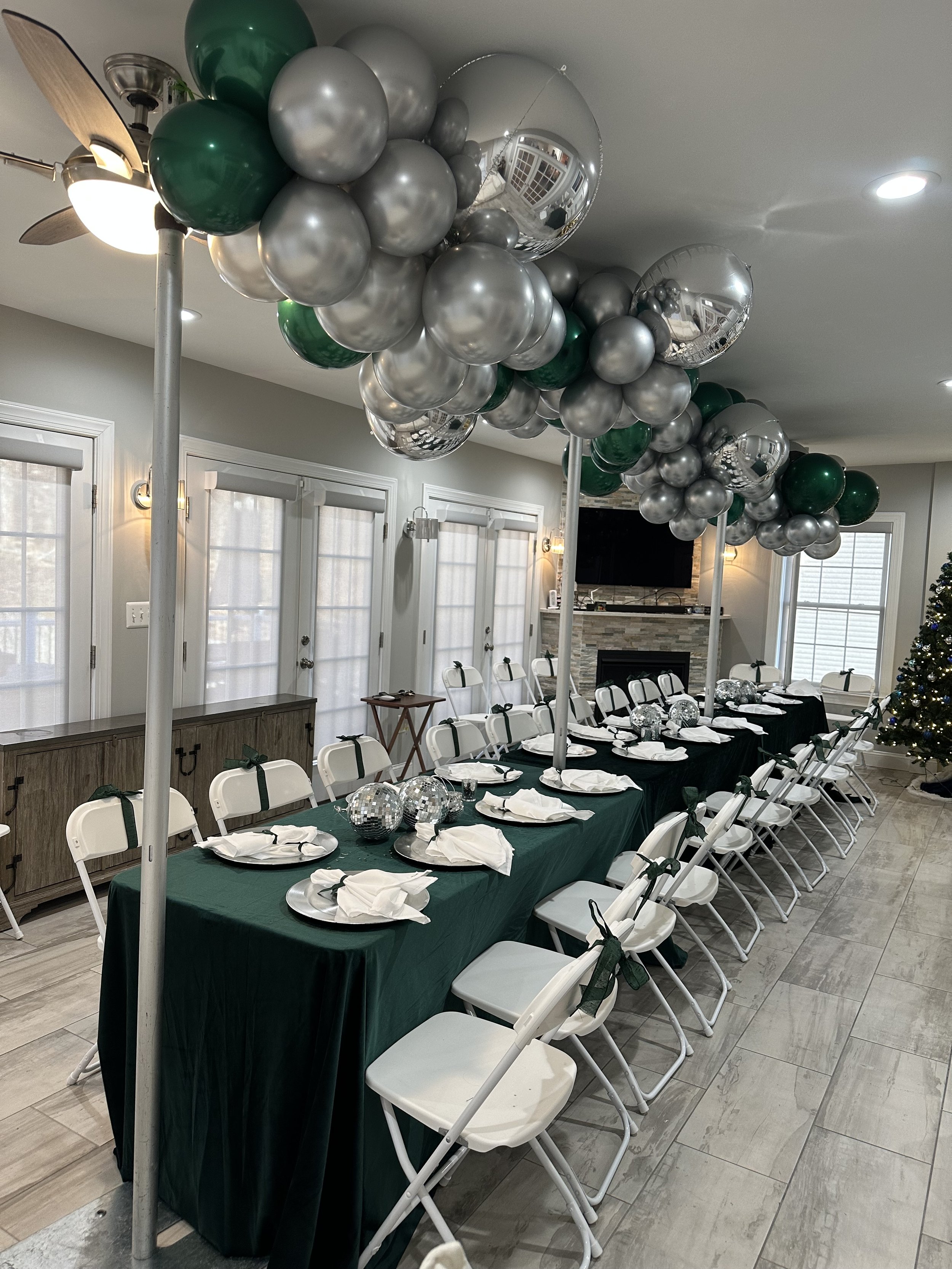 ITEM #28:

FLOATING GARLANDS:
Can be suspended from Ceiling OR installed without. Ask your Designer. 
Colors?
Length?
Theme?
Need string lighting added?

Give us a Call or Fill out our Form. We can customize a Design for you!

Send us an Email: info@
