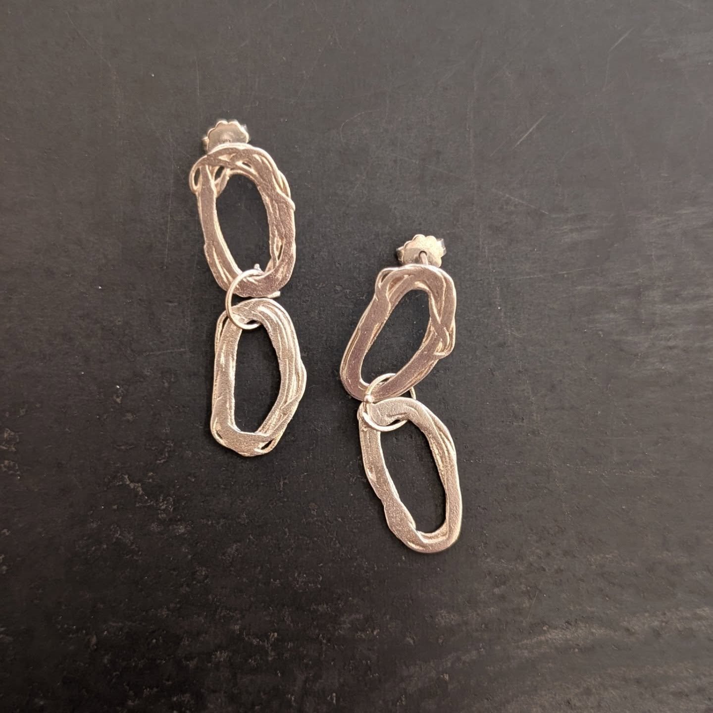 Silver earrings from the knotted collection. Recently bought and the customer sent me a very lovely pic of her wearing them.  Thank you!
*
Today and tomorrow are the last chance to buy something for Christmas, then we'll be in the studio, but availab