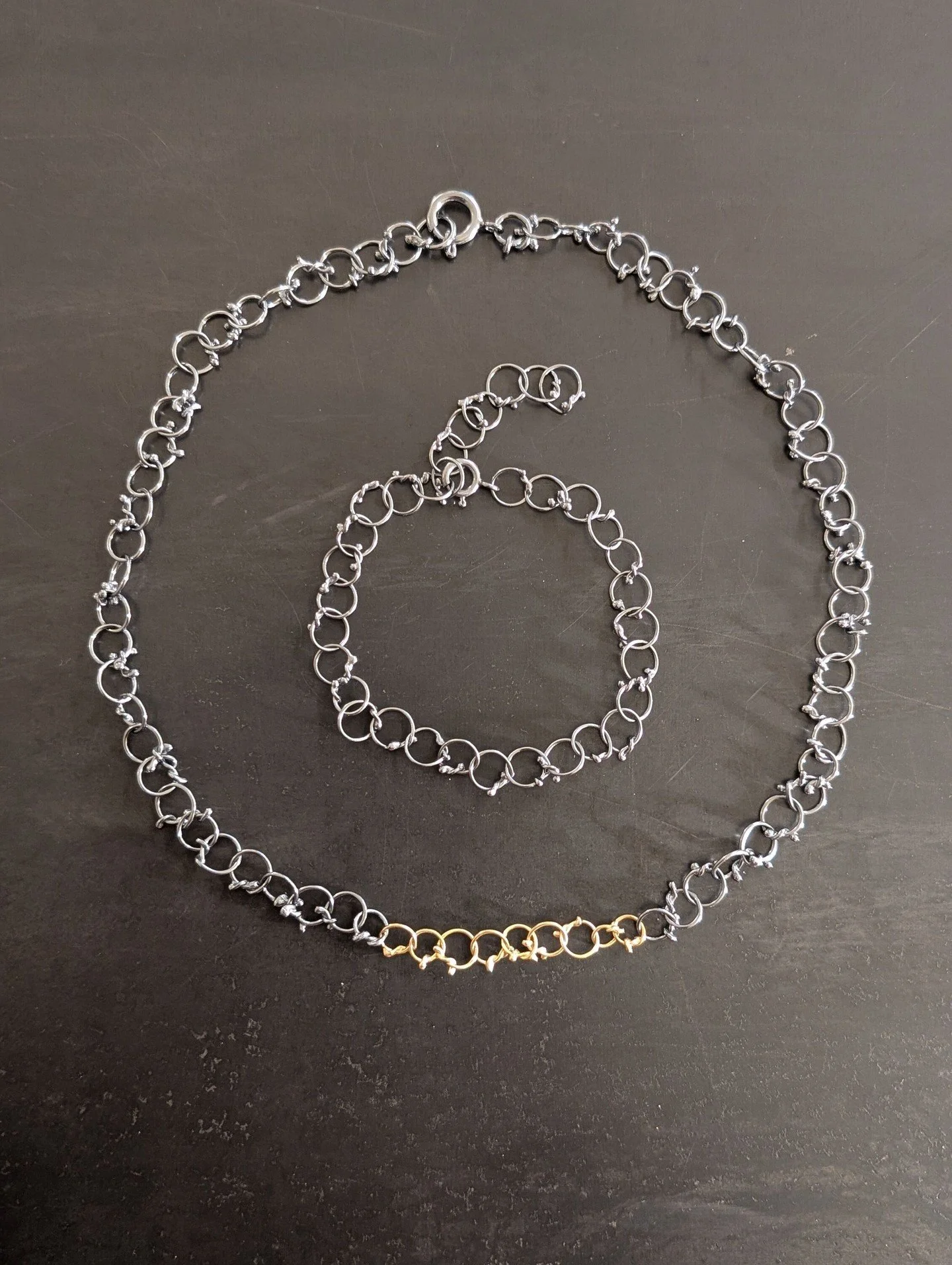 Knotted necklace made with sterling silver and yellow gold 750 with matching bracelet. I love the contrast of colors!!
*
For inquiries and further details, DM or click the link in bio. Or come to find our jewellery @whatifberlin. Tuesday - Friday 15: