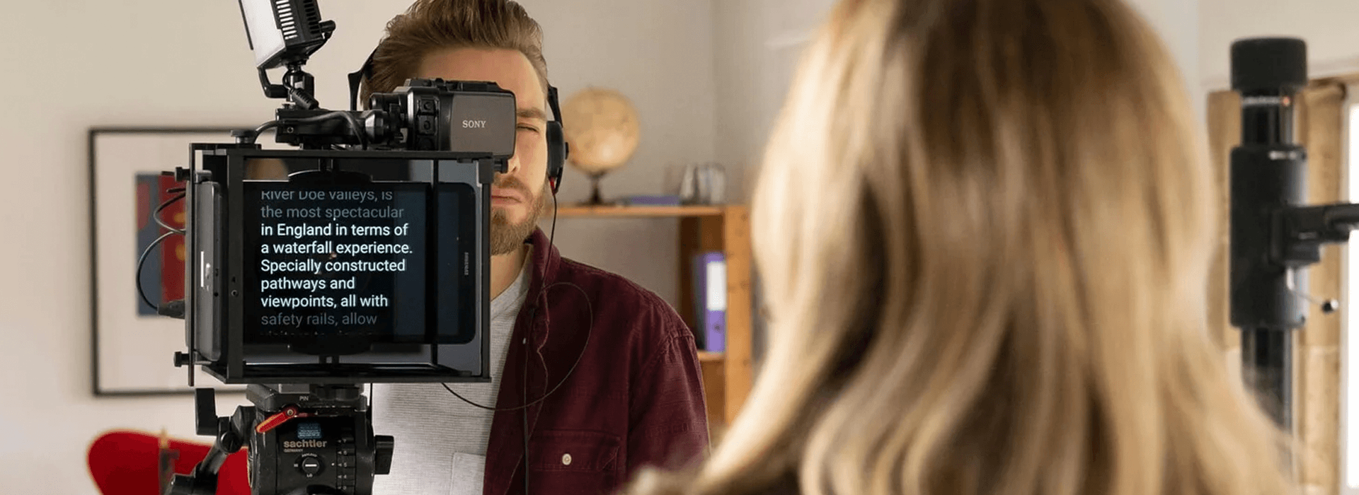 Teleprompter setup being used for a business video recording