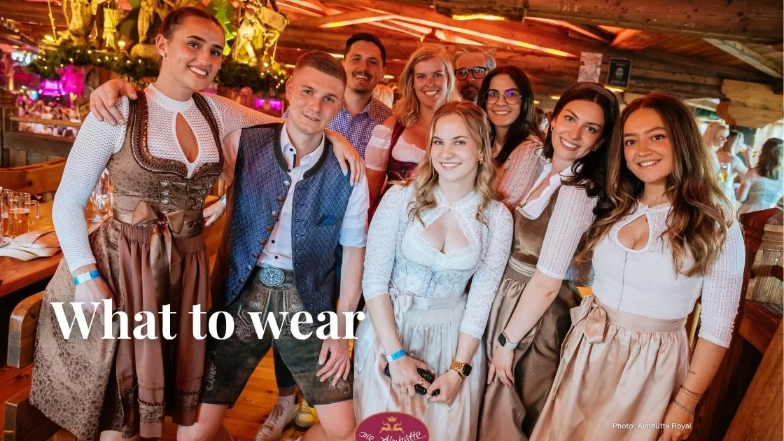 Patrons of Almhütte Royal in Tracht (traditional Dirndl and Lederhosen)