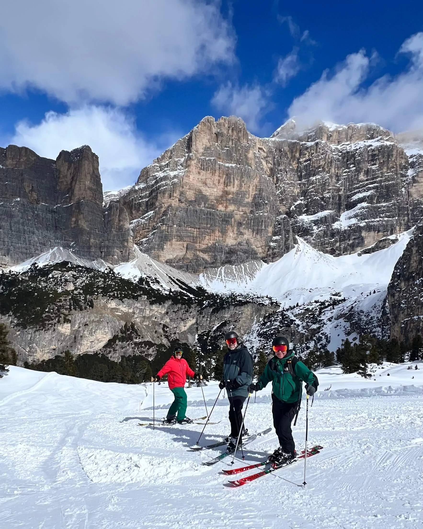Three skiers skiing the Hidden Valley in the Italian Dolomites