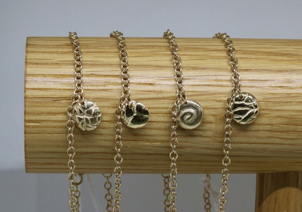 18ct gold plated element bracelet