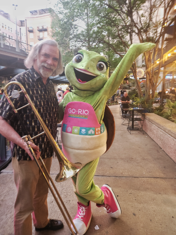 Dave Deering with Marina, river boat operator GO RIO's mascot