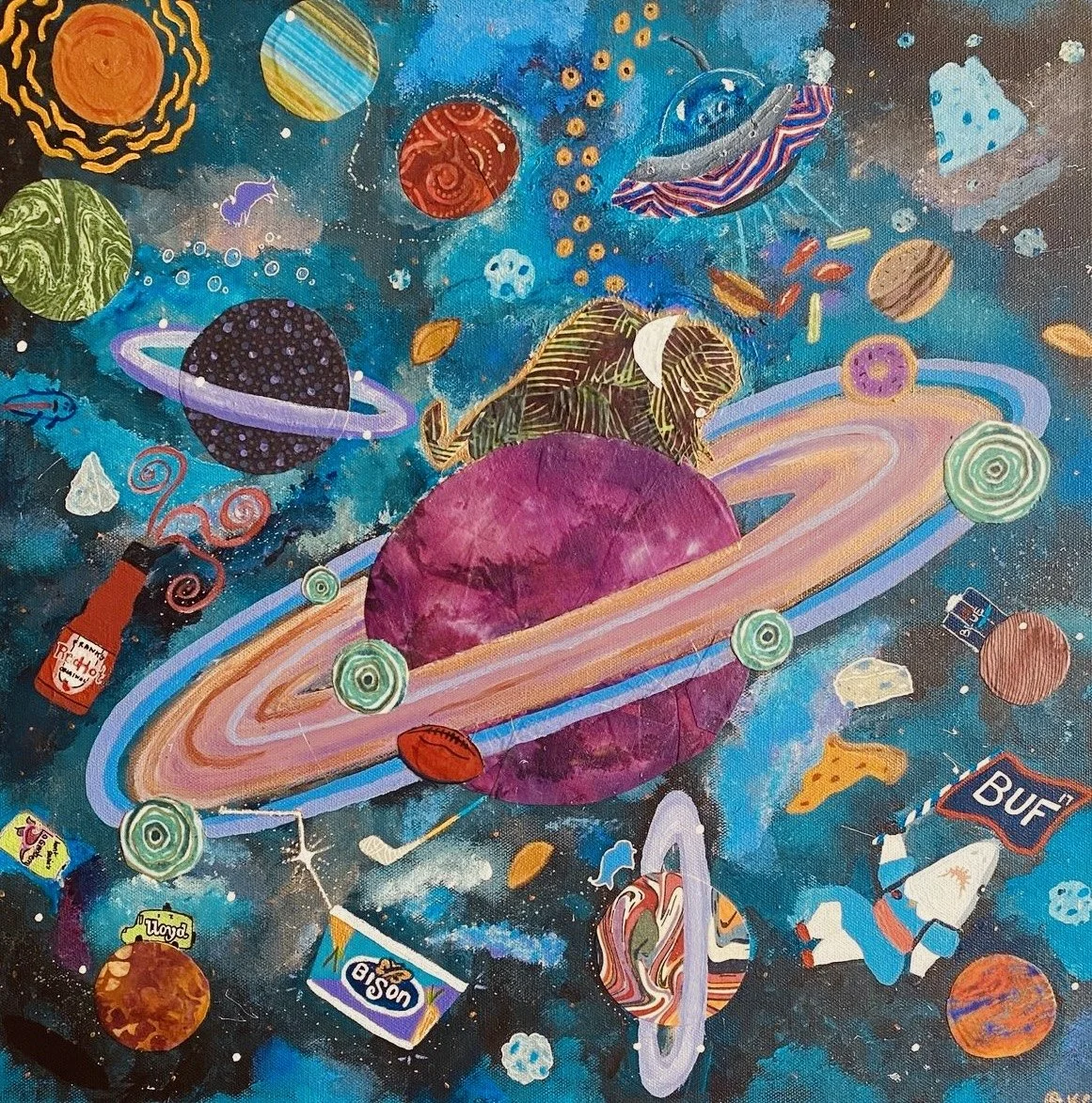 Fabric collage creating planet saturn with Buffalo related iconography