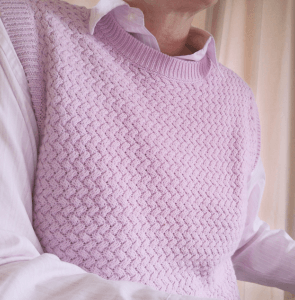 Creative coach Katch in pink vest