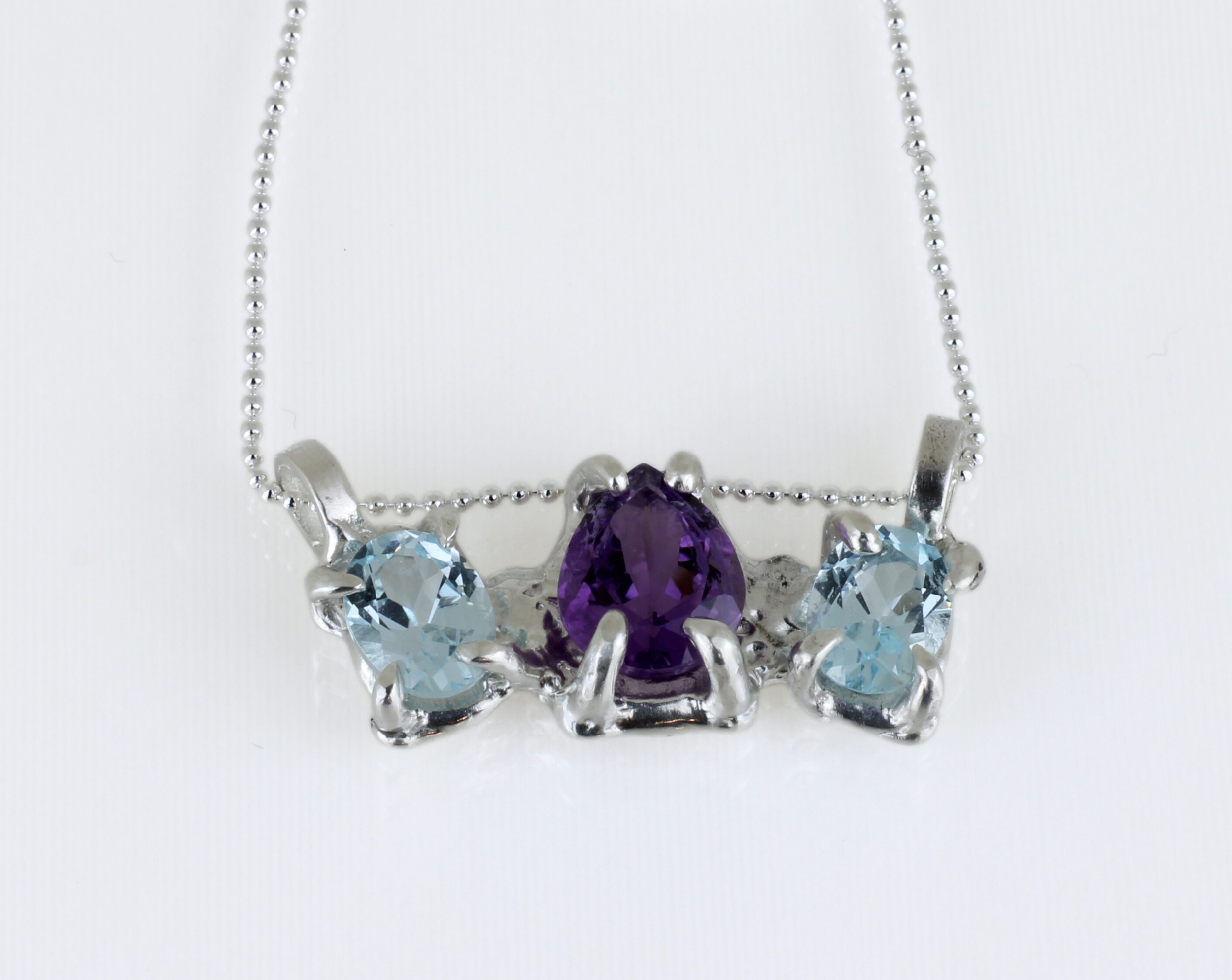 Midnight Mystic Amethyst Pendant flat lay.png