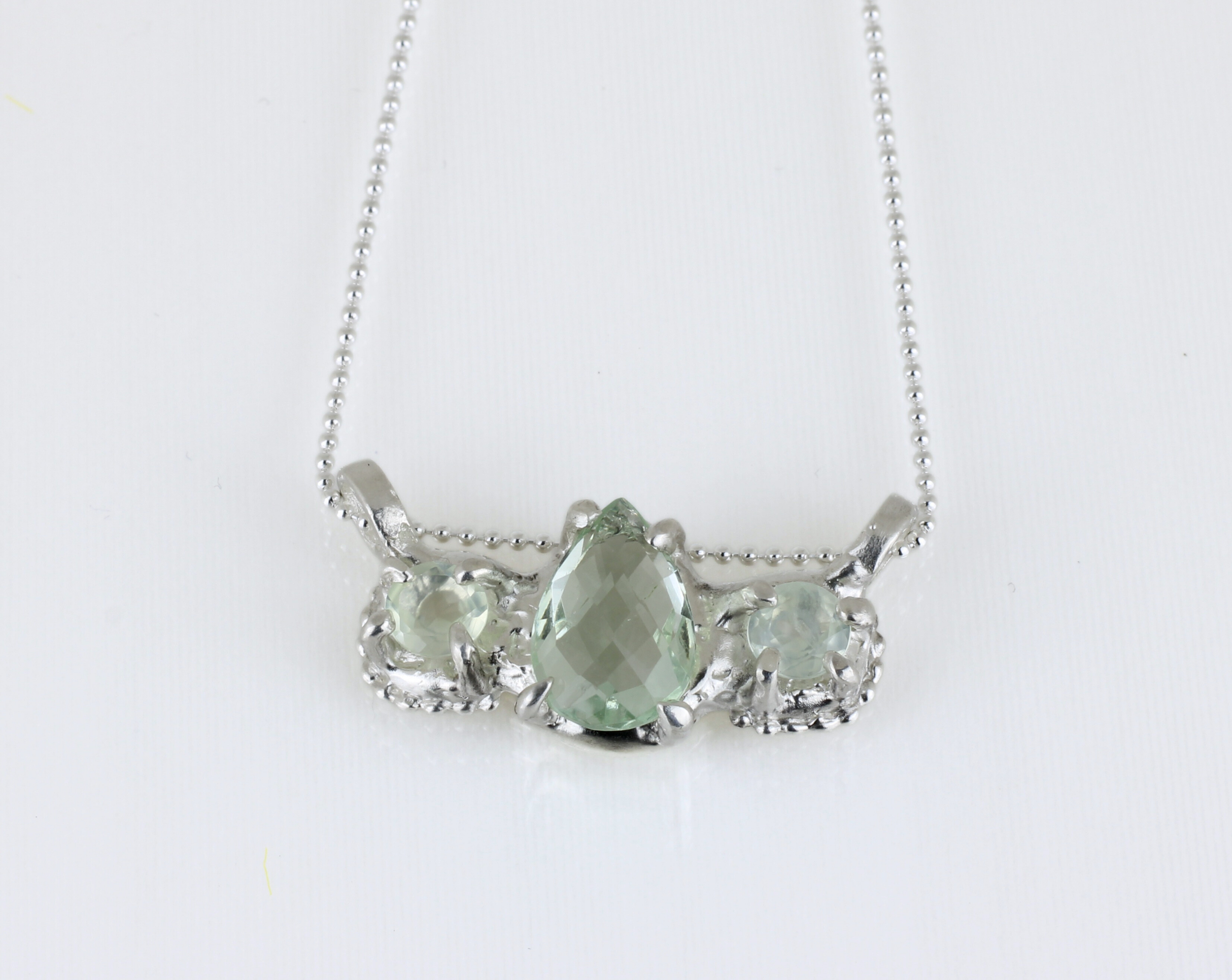 Green Amethyst pendant flatlay.png