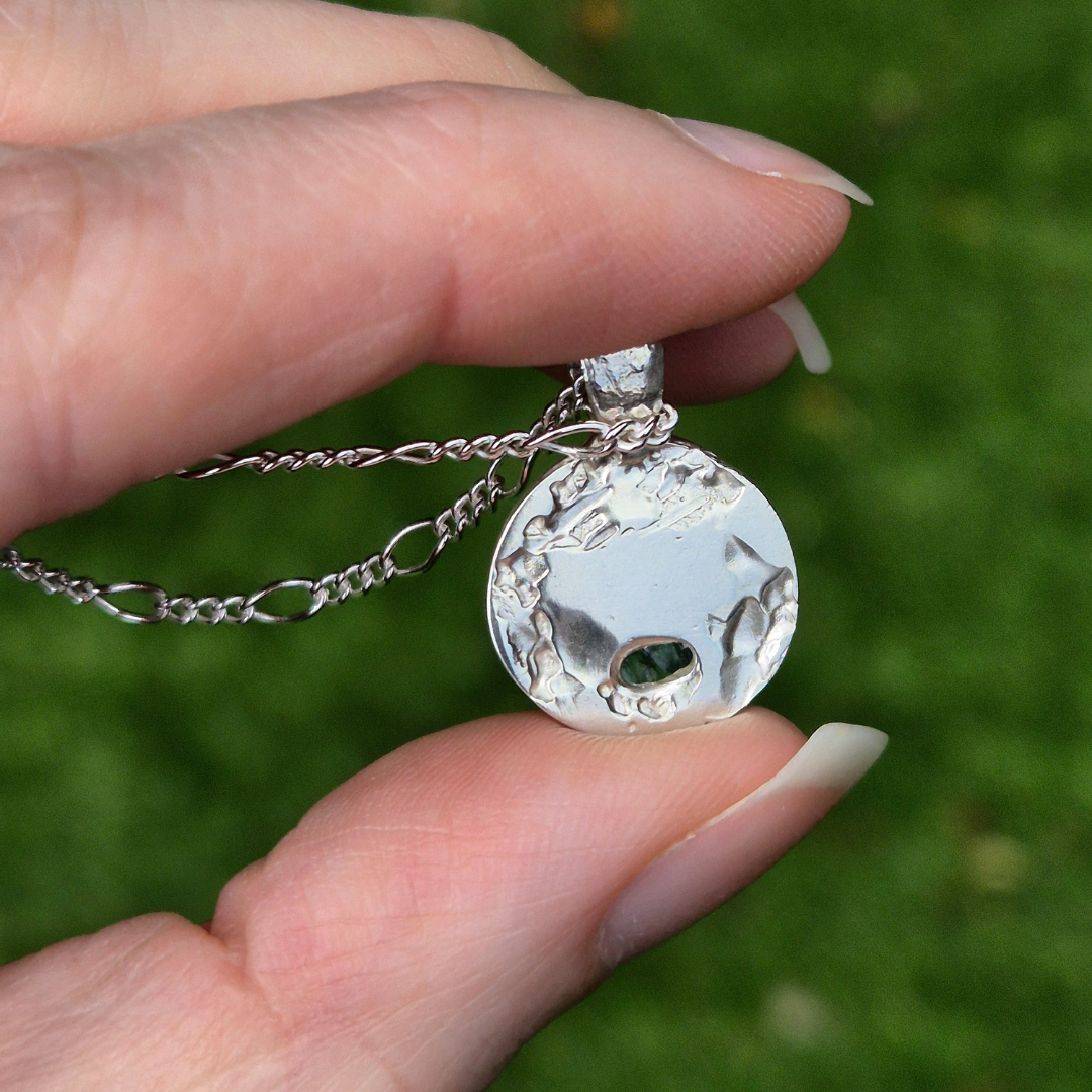 Natural light Ocean blue apatite back.png