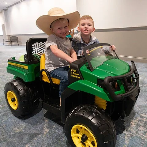boys with toy from auction.jpg