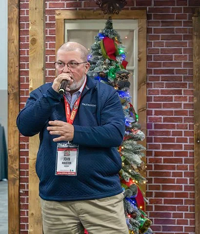 auctioneer John Houston.jpg