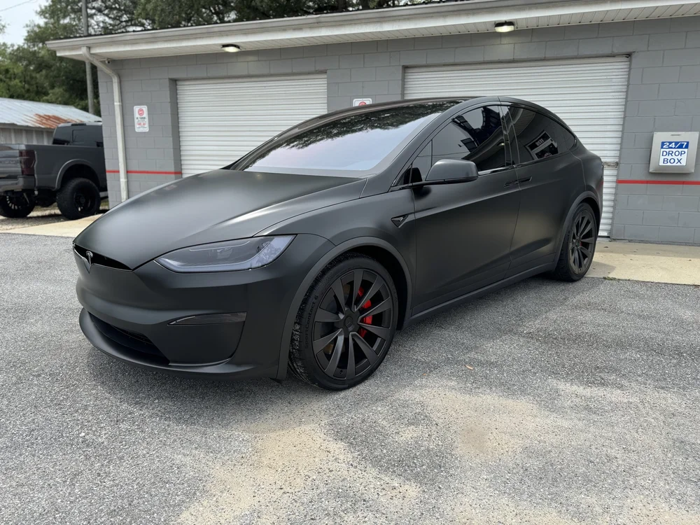 Tesla Model S: Ceramic window tint at OCD Tinting & Wraps, Fort Walton Beach