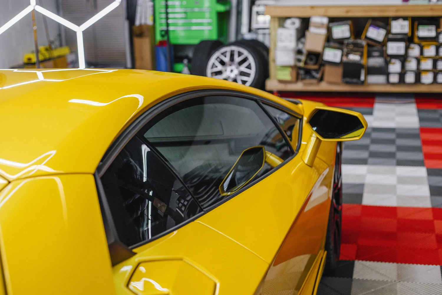 Finished automotive window tint installation by OCD